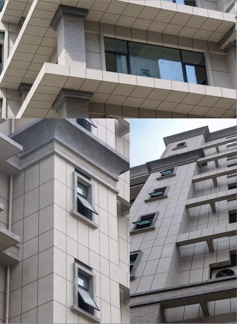Modern building facade with light beige tiles, stone accents, and open windows against a blue sky.